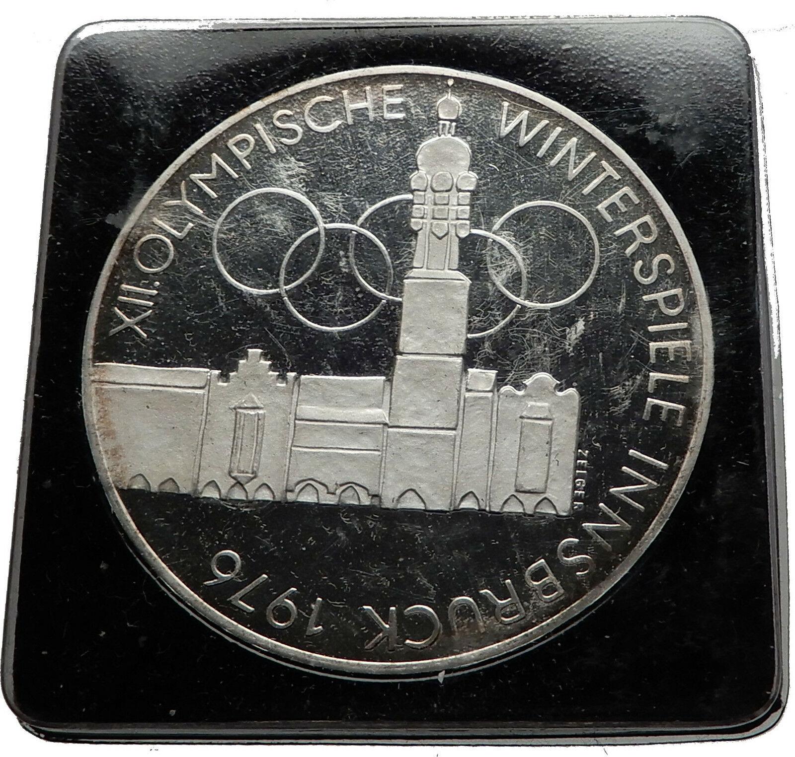 1976 Innsbruck Buildings WINTER Olympic Games AUSTRIA Proof SILVER Coin i60629