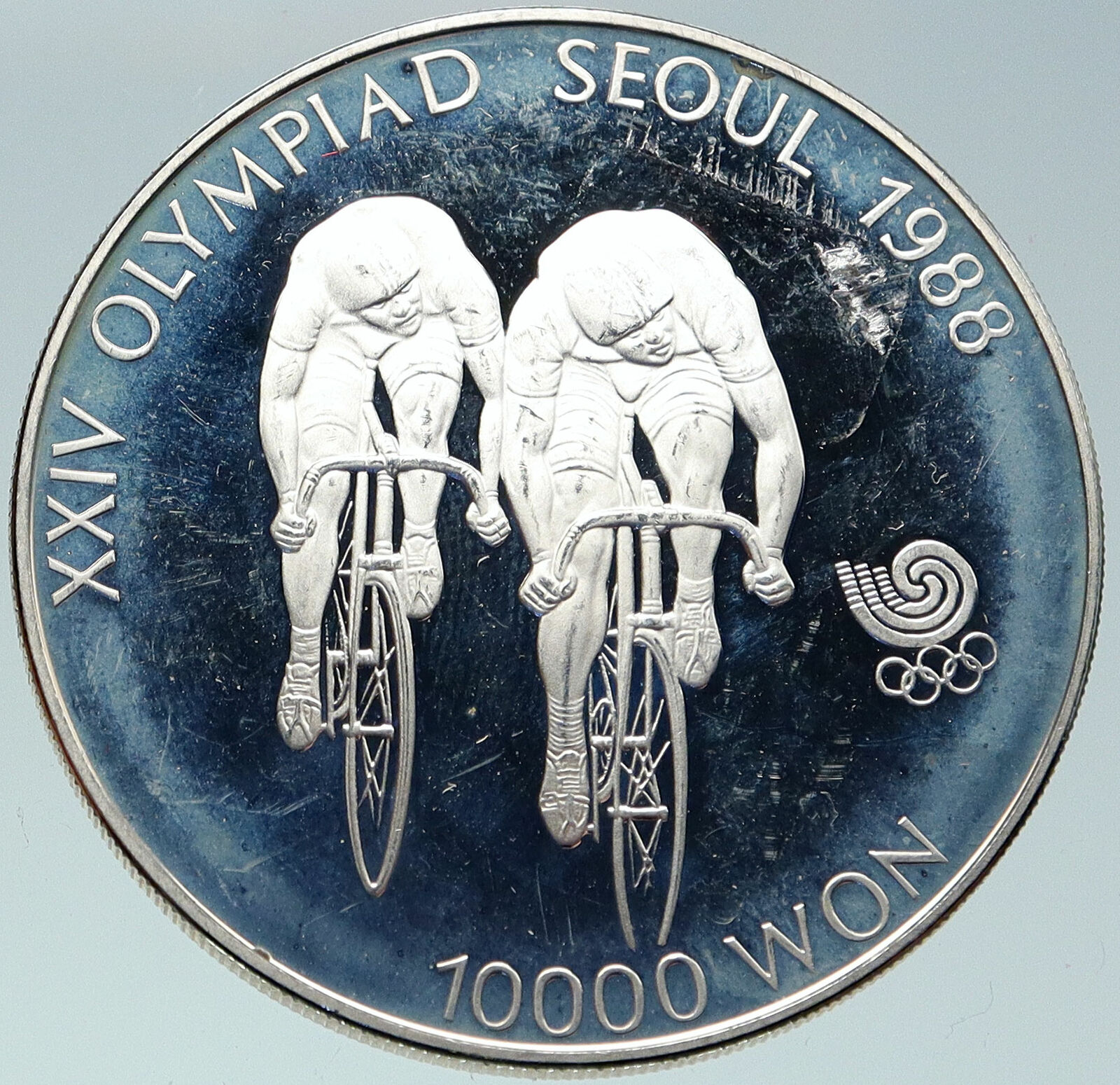 1988 SOUTH KOREA Seoul OLYMPIC GAMES CYCLISTS Old Proof Silver 10K W Coin i86583