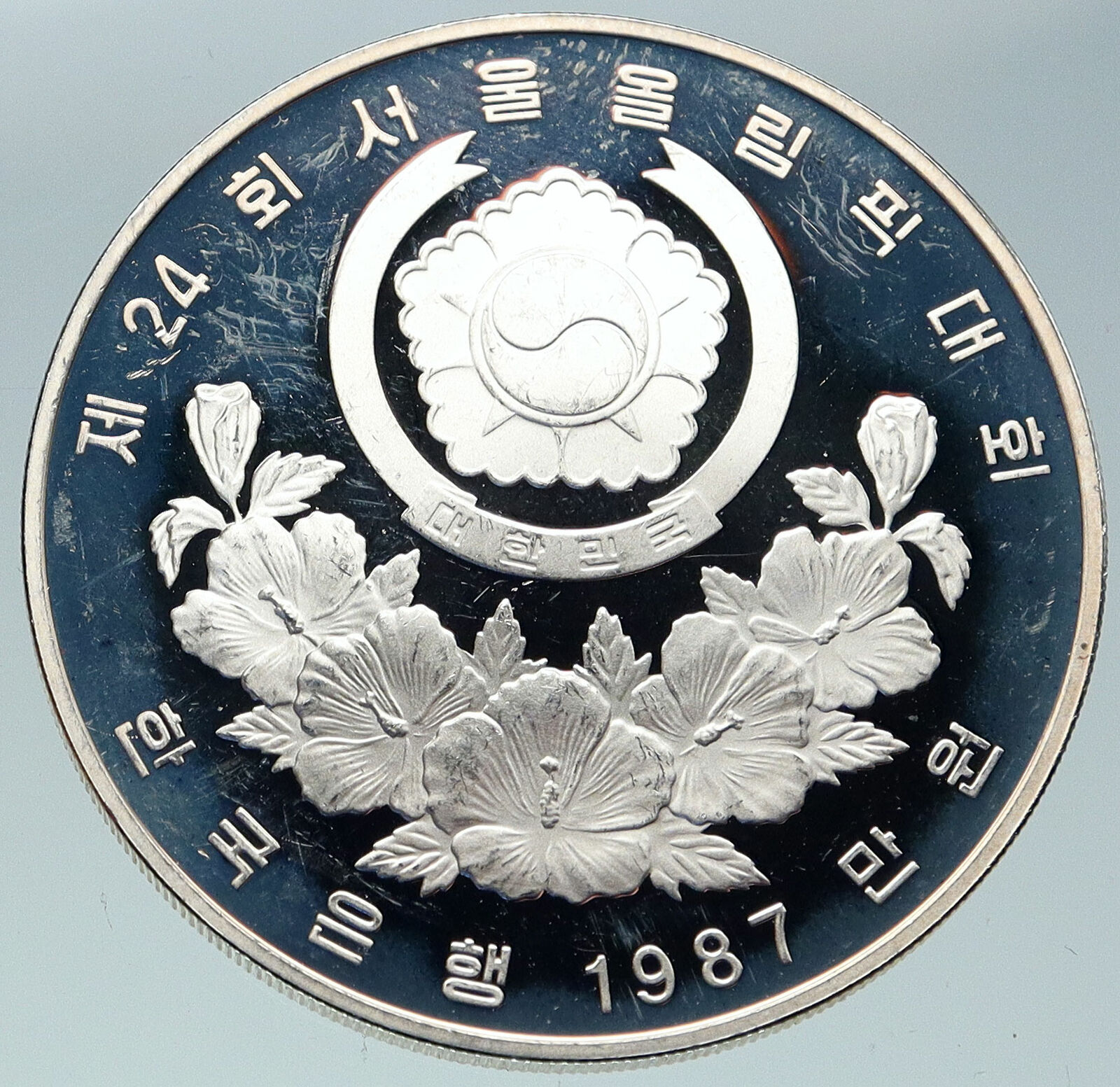 1987 SOUTH KOREA Seoul OLYMPIC GAMES Girl ARCHERY Proof Silver 10K W Coin i86581