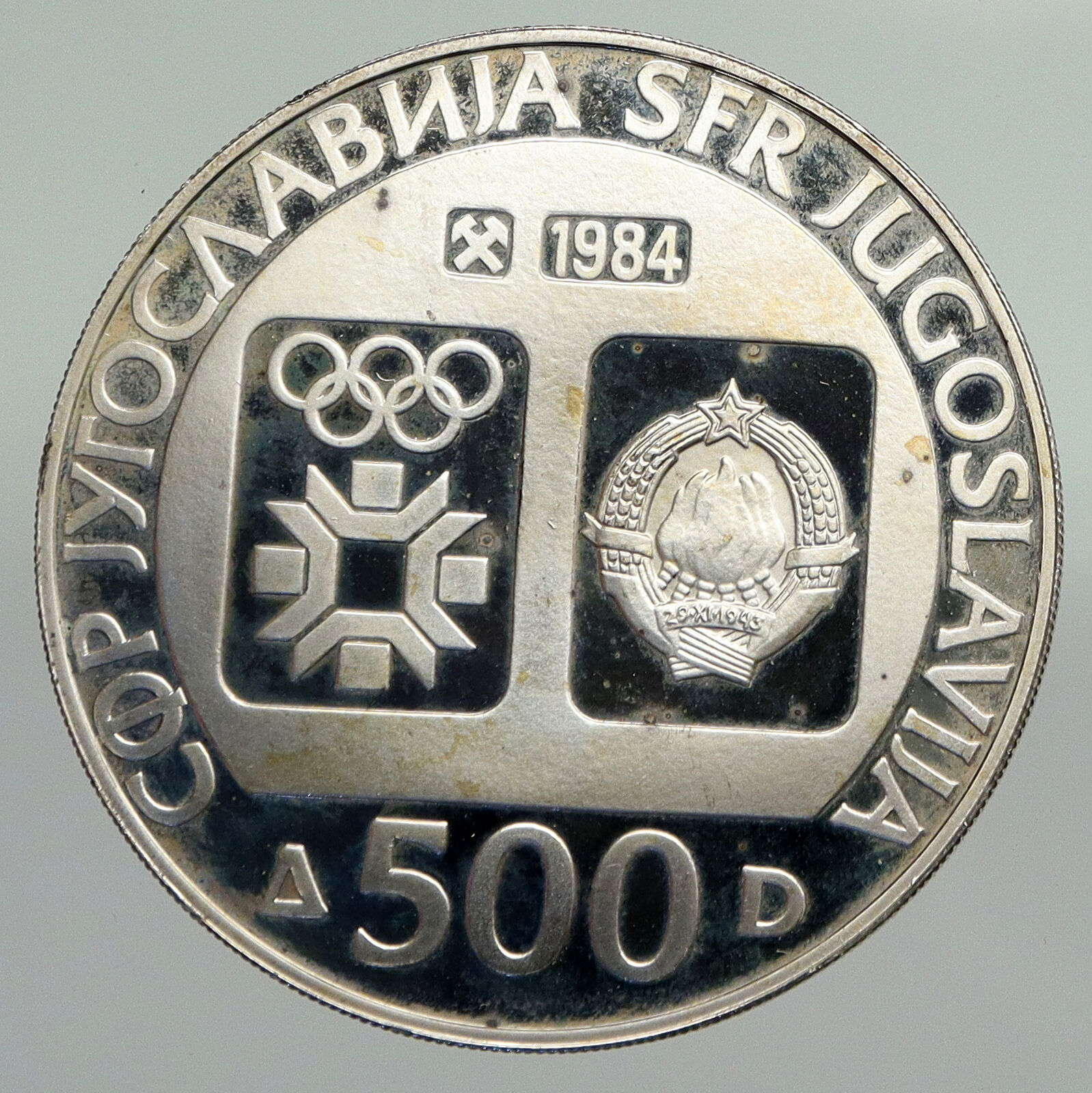 1984 YUGOSLAVIA 84 Winter Olympics SARAJEVO Slalom Skier Silver 500D Coin i92323