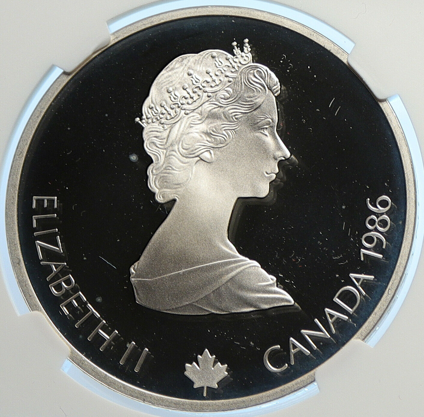 1986 CANADA for 1988 CALGARY OLYMPICS HOCKEY NGC Proof Silver $20 Coin i106457