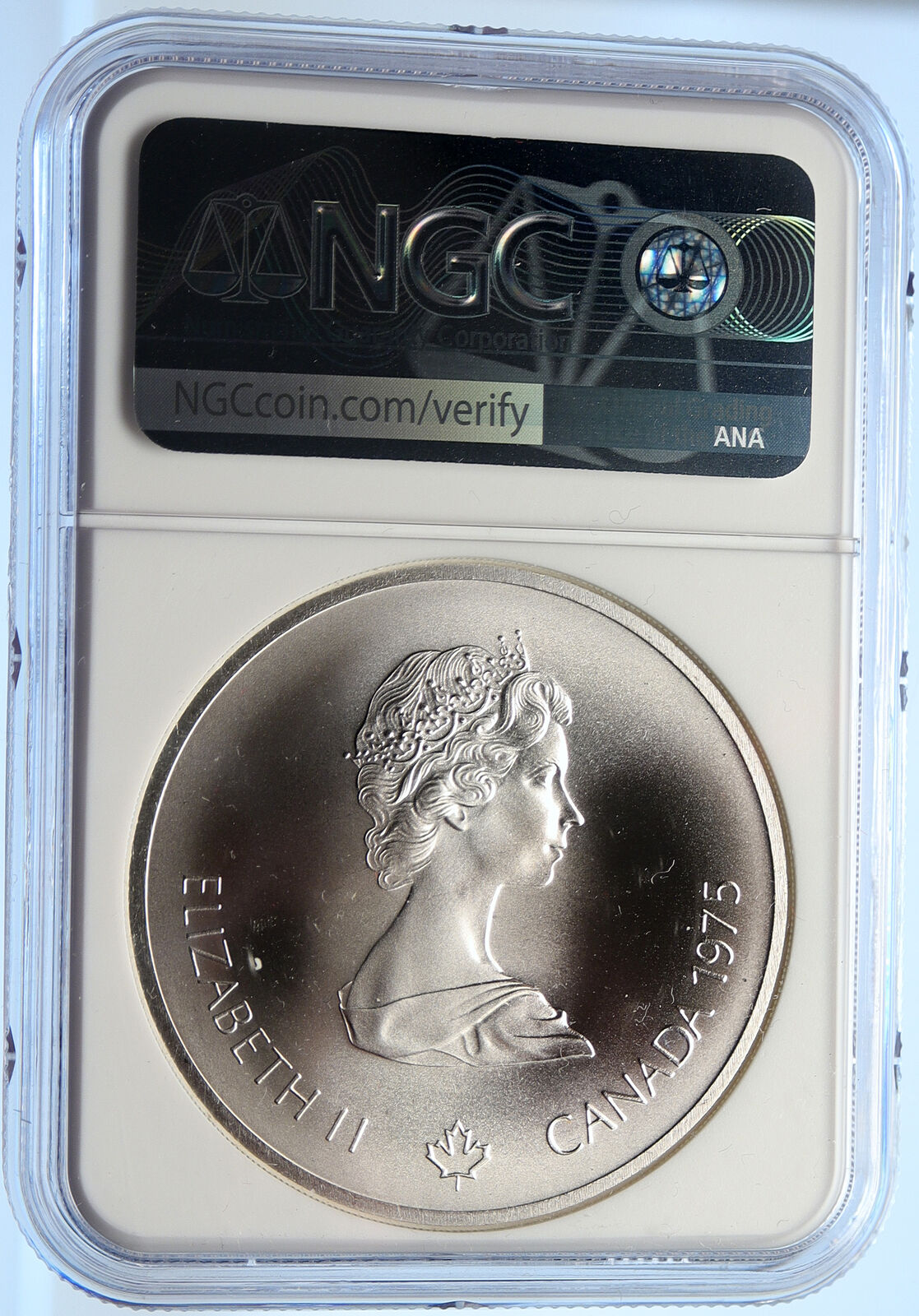 1975 CANADA Elizabeth II Olympic Montreal SHOT PUT Silver $10 Coin NGC i106475