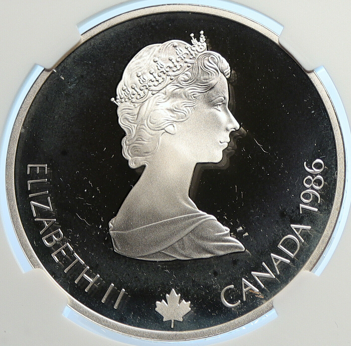 1986 CANADA 1988 CALGARY OLYMPICS Free Skiing Proof Silver $20 Coin NGC i106453