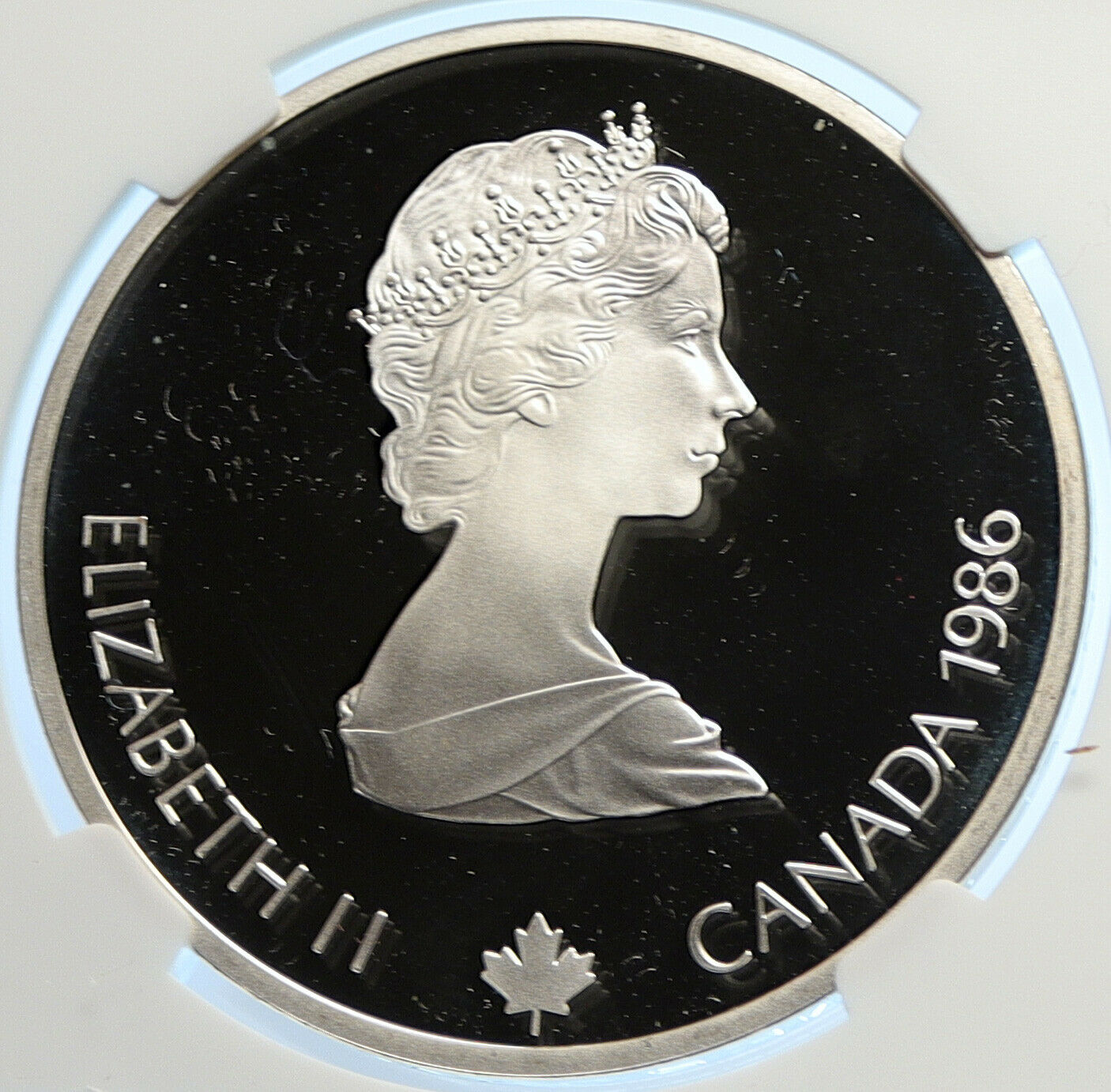 1986 CANADA for 1988 CALGARY OLYMPICS HOCKEY NGC Proof Silver $20 Coin i106455