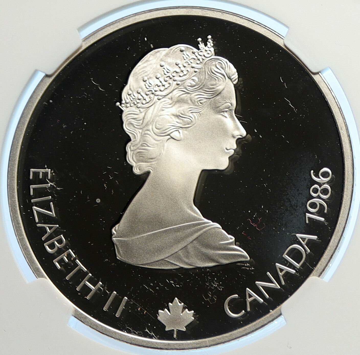 1986 CANADA for 1988 CALGARY OLYMPICS HOCKEY NGC Proof Silver $20 Coin i106456