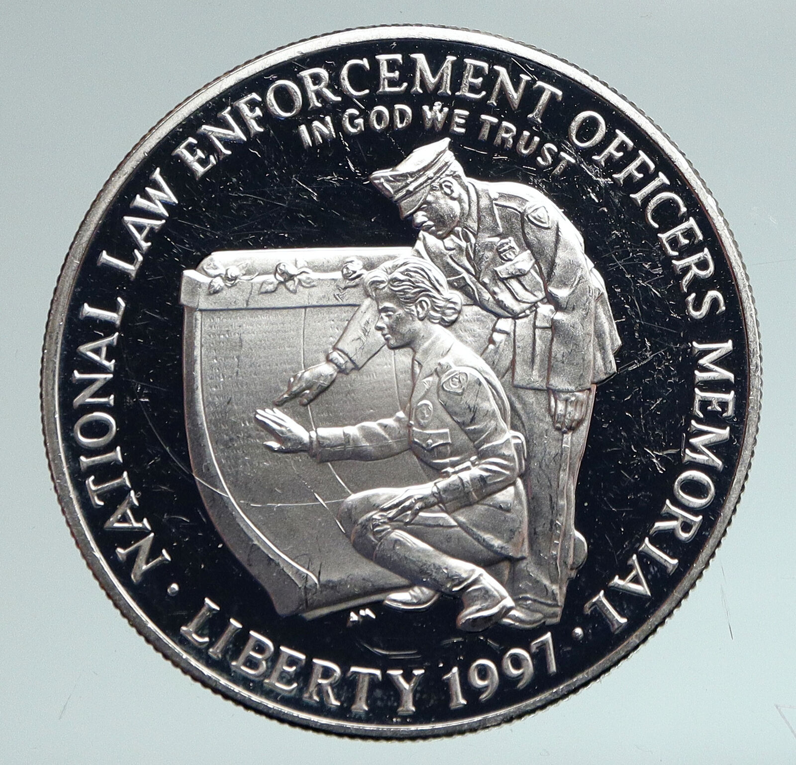 1997 USA United States HONOR LAW ENFORCEMENT Protect Proof Silver $ Coin i90948