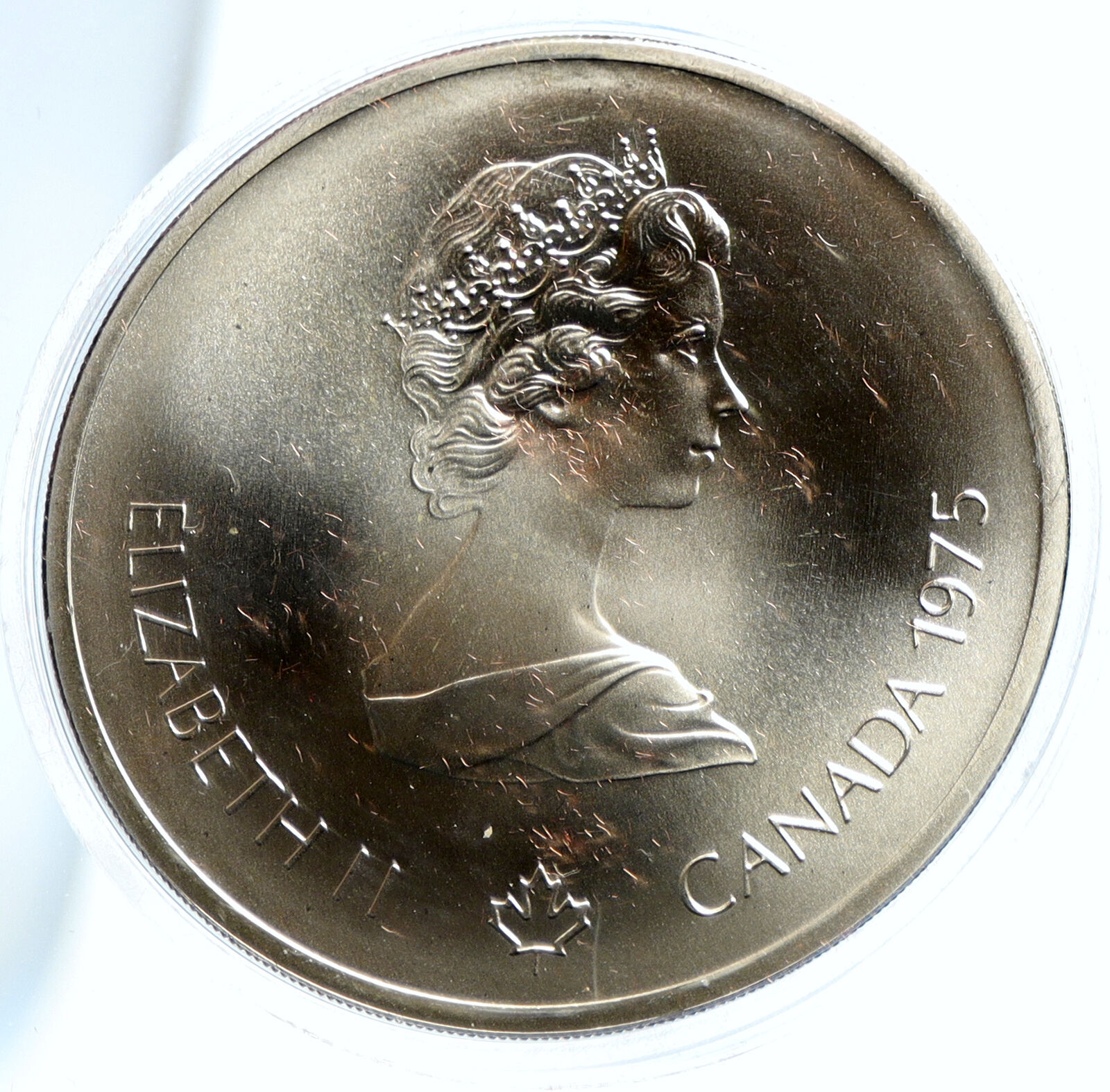 1975 CANADA Elizabeth II Olympic Montreal SHOT PUT BU Silver $10 Coin i103773