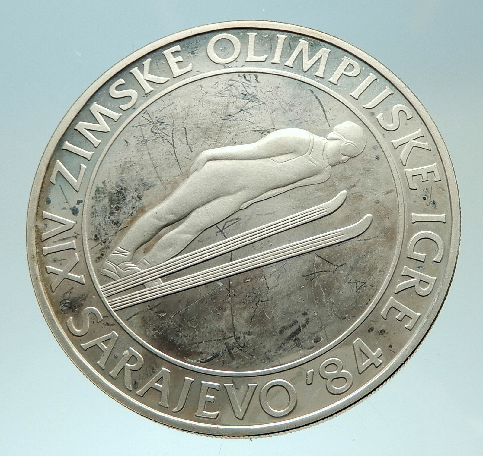 1983 YUGOSLAVIA Sarajevo XIV Olympic Games Ski Jumper Genuine Silver Coin i76884