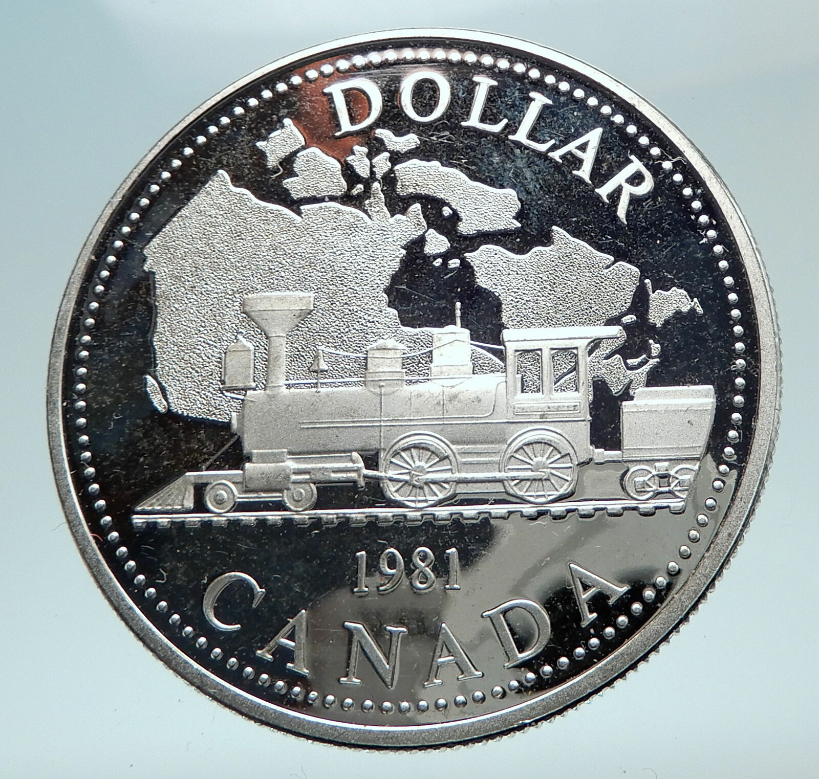 1981 CANADA w UK Queen Elizabeth II Railway Train Silver Dollar Coin i81008