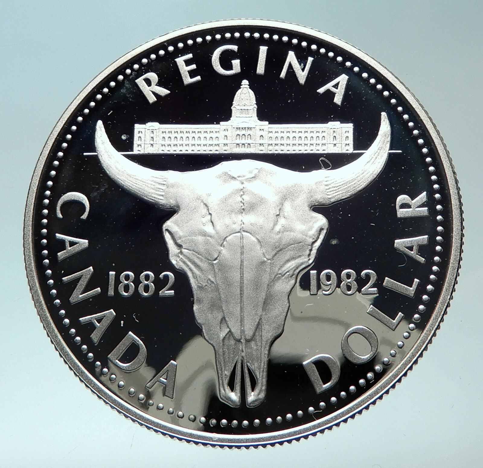 1982 CANADA UK Queen ELIZABETH II Cattle Skull Proof Silver Dollar Coin i82287