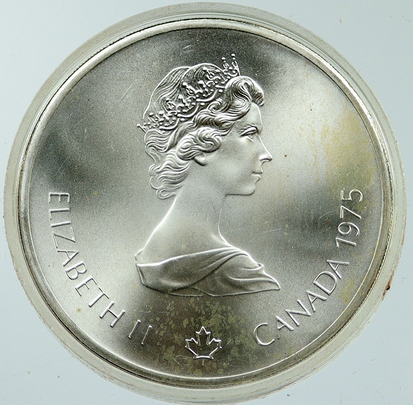 1975 CANADA Elizabeth II Olympic Montreal SHOT PUT BU Silver $10 Coin i116877