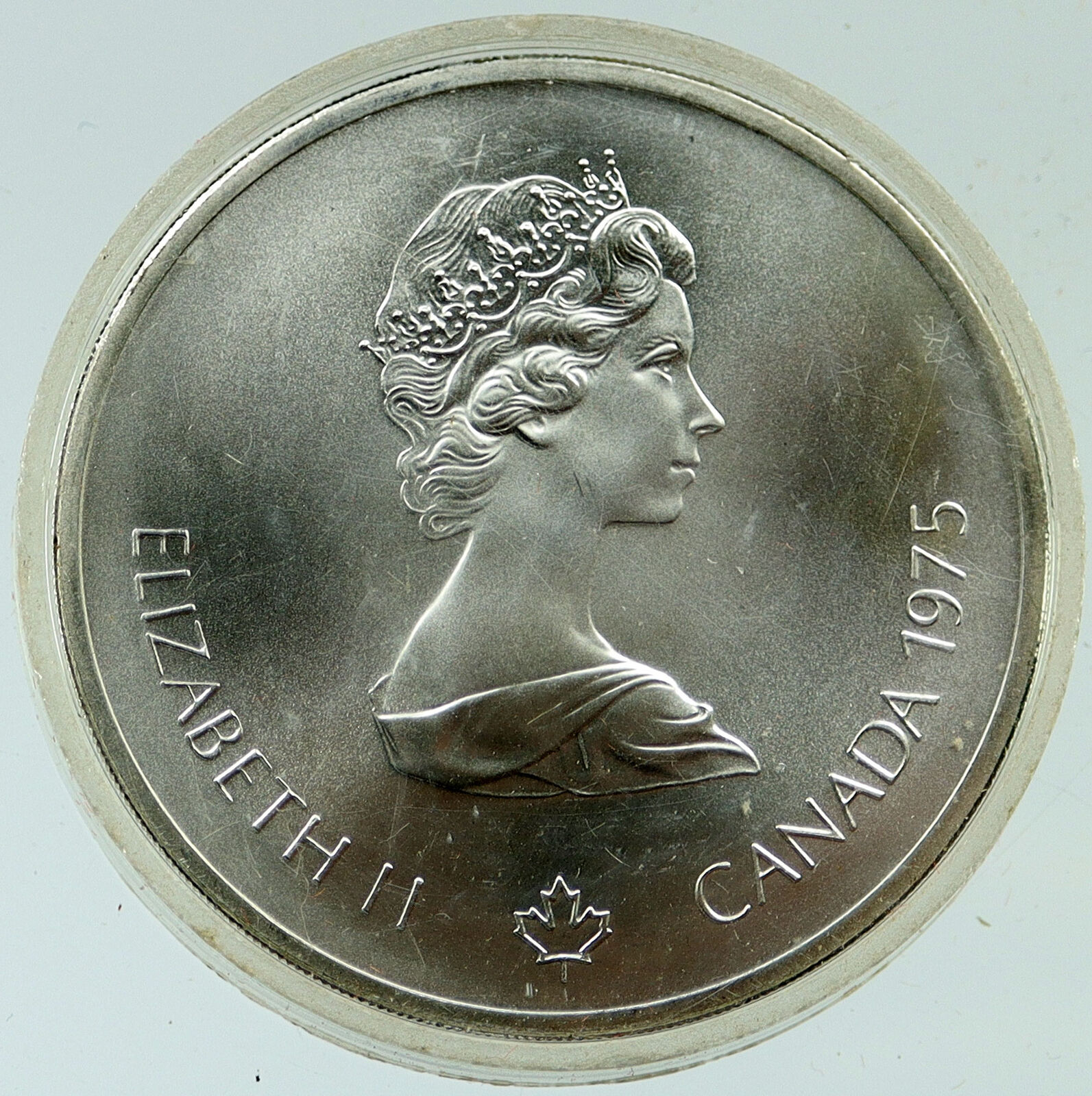 1975 CANADA UK Elizabeth II Olympics Montreal Paddler BU Silver $10 Coin i116928