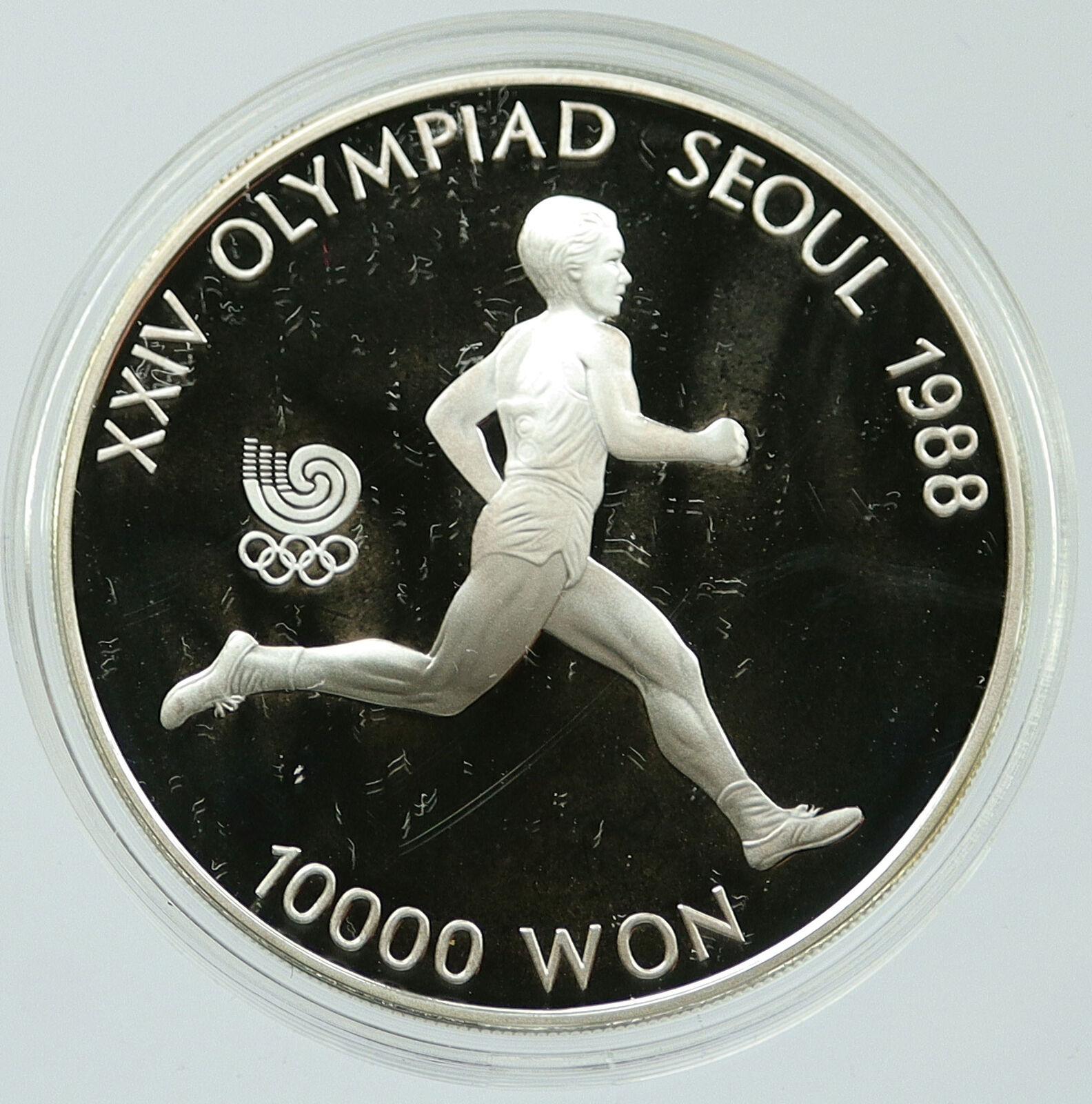 1988 SOUTH KOREA Seoul OLYMPICS Runner Track Proof Silver 10000 Won Coin i117466